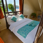 Custom made 4-Poster Bamboo eco beds give you a comfortable nights sleep over looking the ocean view of south Cebu Philippine, Oslob, Boljoon