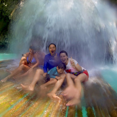 Get a natural massage at Kawasan Waterfall Tour on the bamboo raft