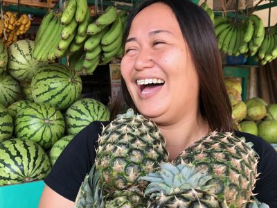 Happy smiling Filipino Filipina Fruit vendor Joy